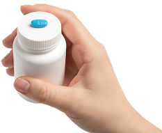 Een hand houdt een medicijnblikje vast