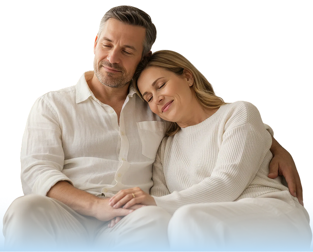 Couple embracing on a sofa